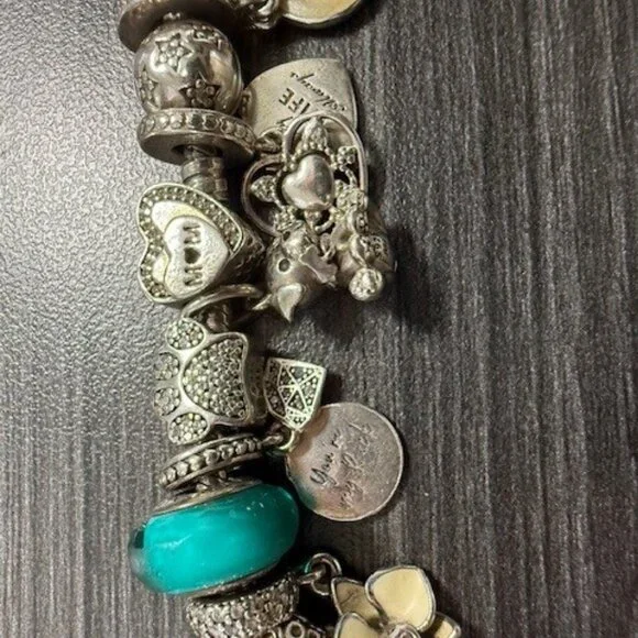 Authentic S925 Pandora Bracelet with 30 charms in excellent Preloved condition - Picture 5 of 9